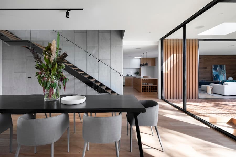 Modern apartment interior with warm neutral finishes and daylight